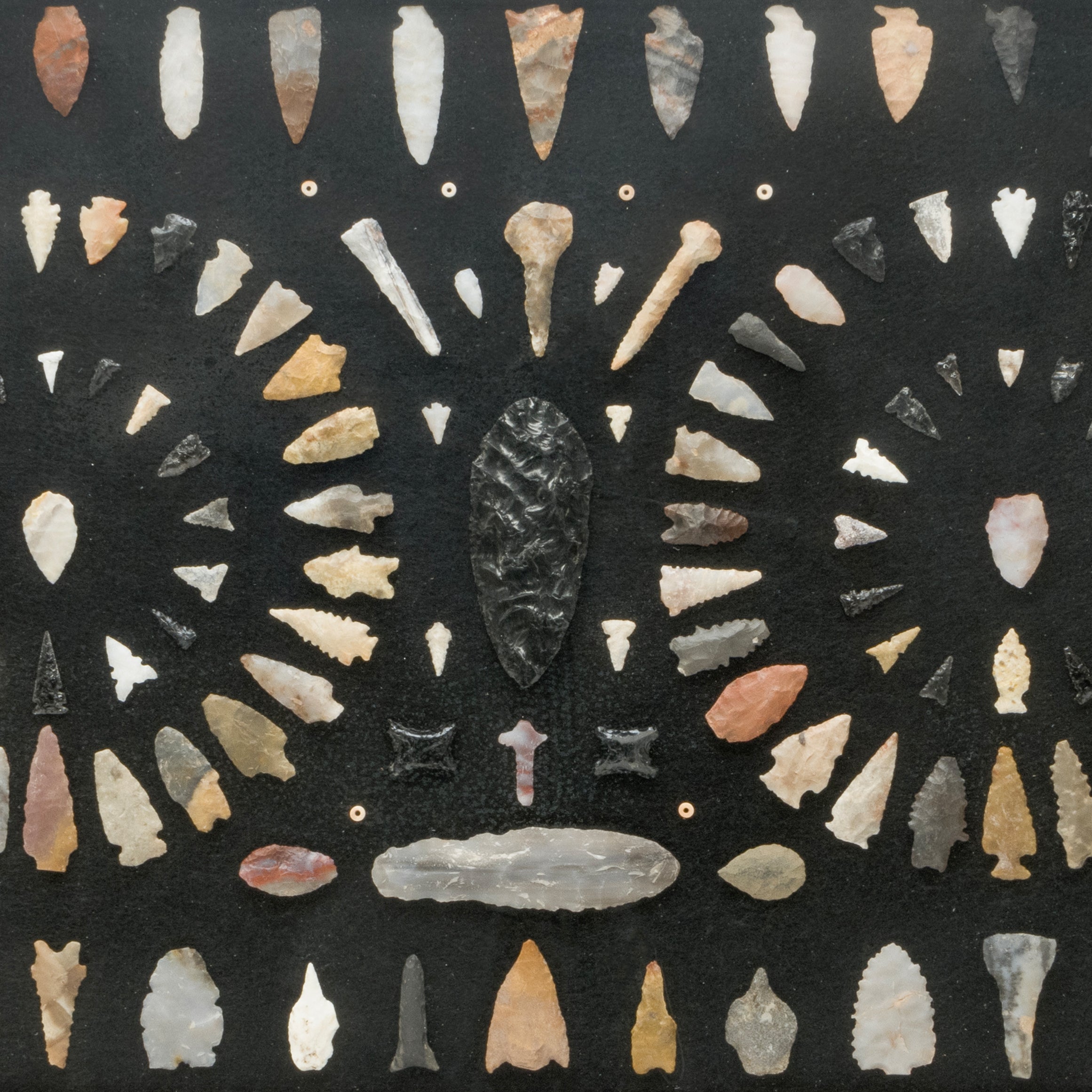 Native American Stone Tools and Arrowhead Display