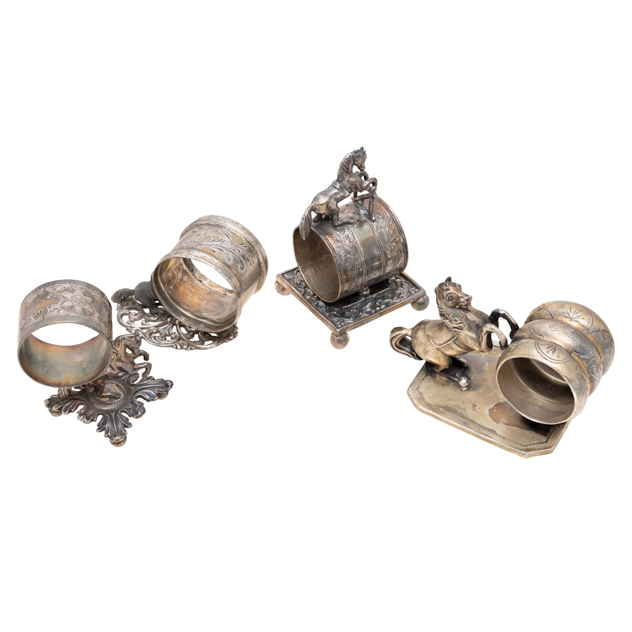 Four Victorian Silverplate Horse Napkin Rings
