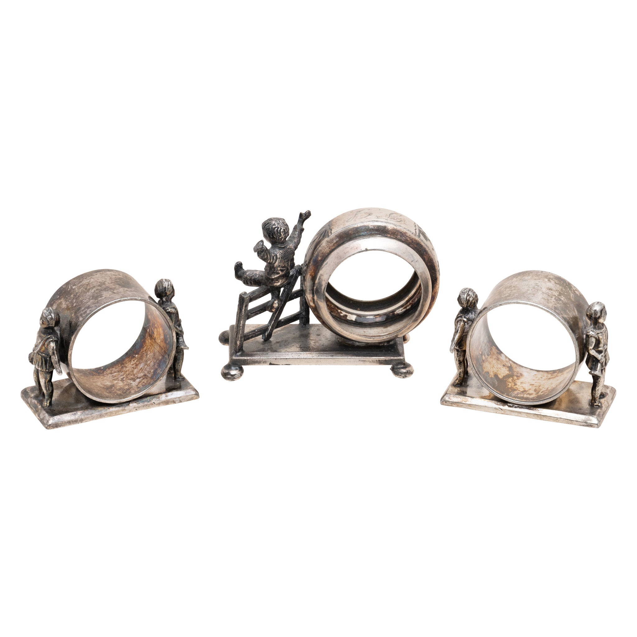 Three Victorian Silverplate Figural Napkin Rings