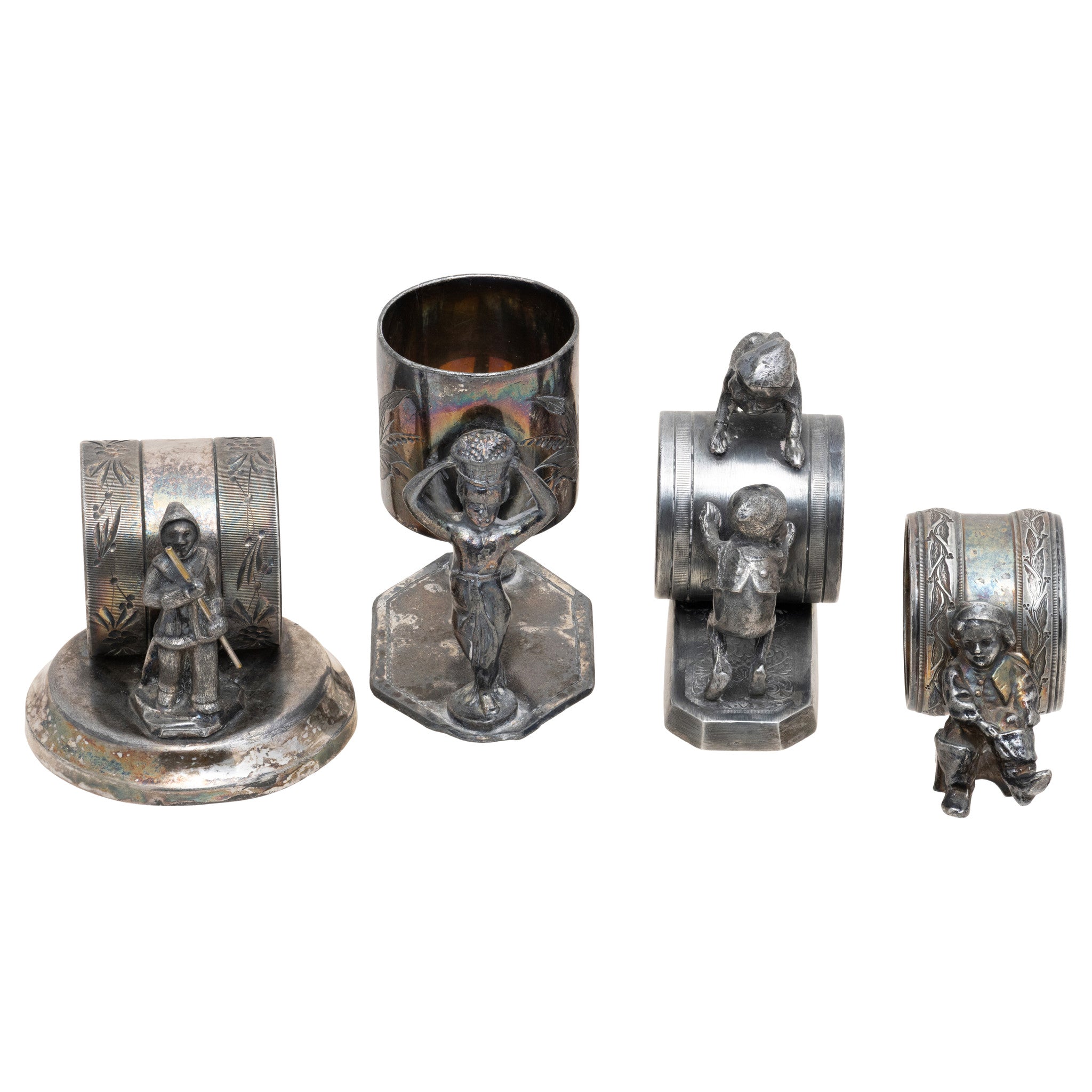 Four Figural Victorian Silverplate Napkin Rings