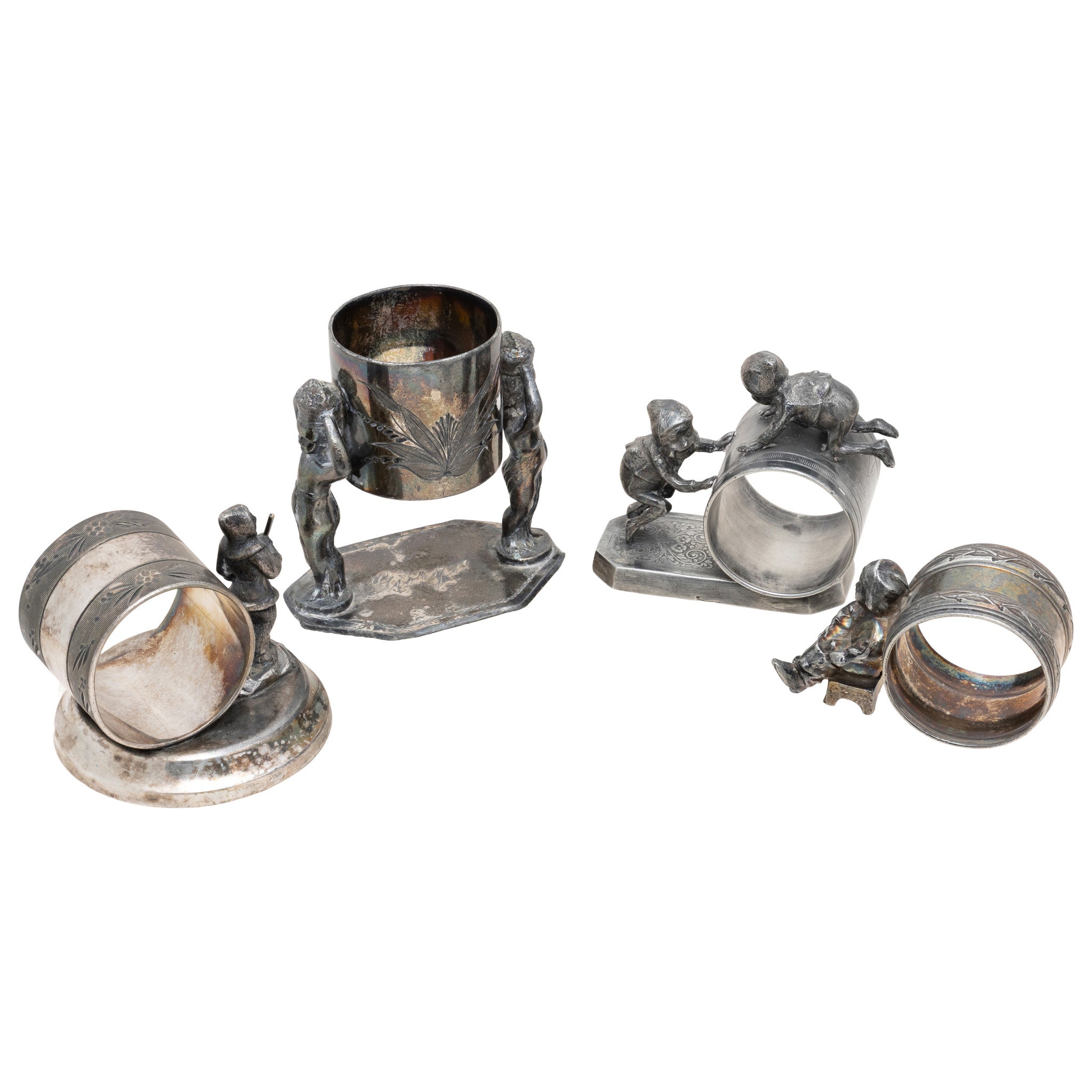 Four Figural Victorian Silverplate Napkin Rings