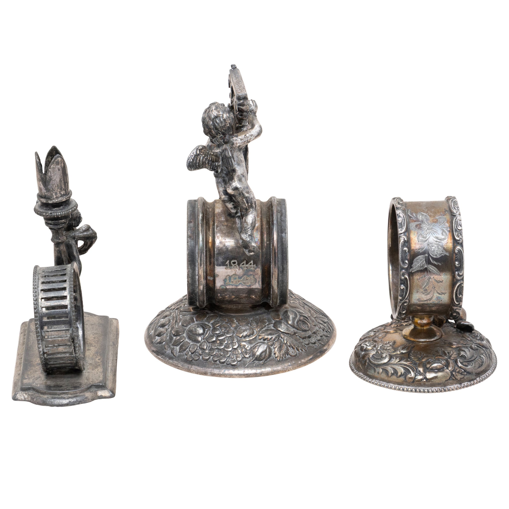 Three Figural Victorian Silverplate Napkin Rings