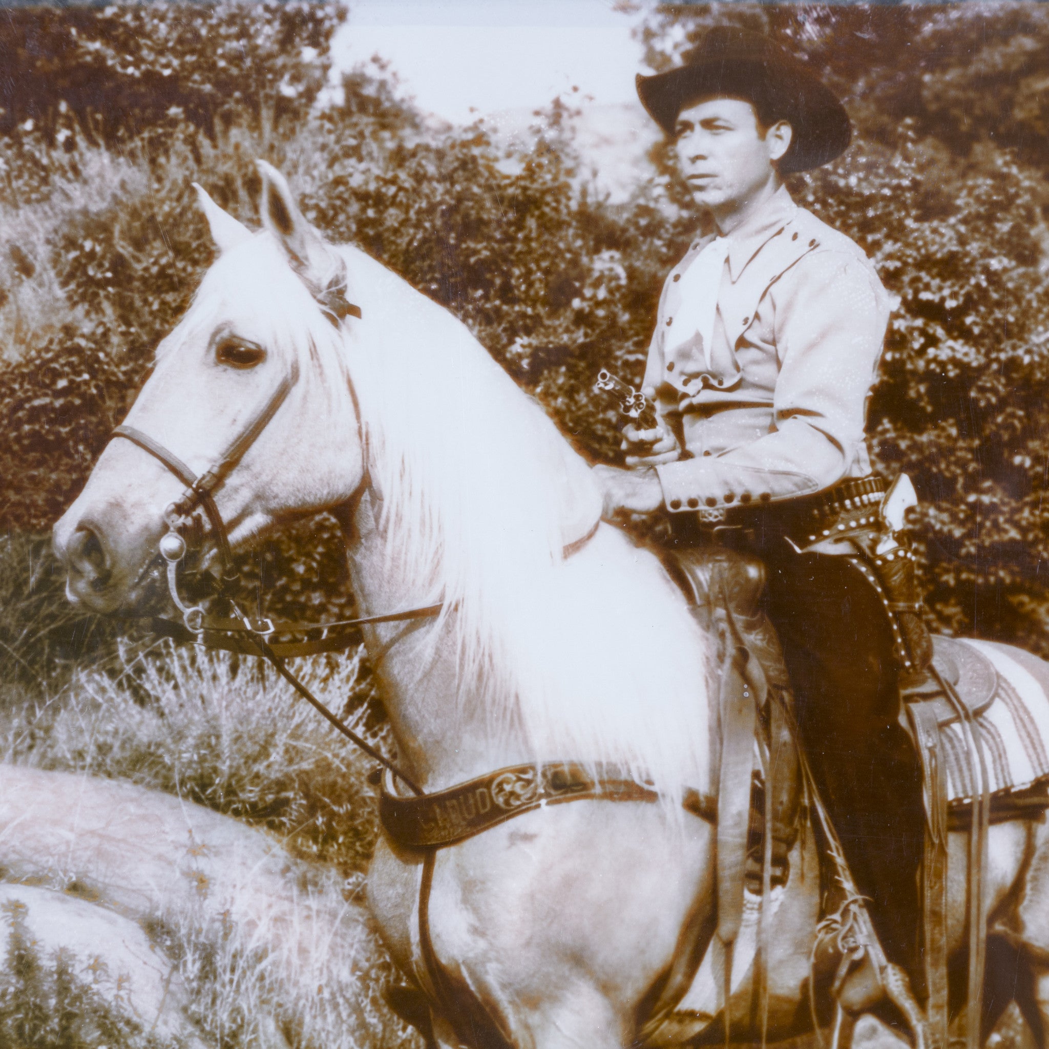 Three Cowboy Photographs